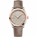 Elegant dress watch with beige textured dial, two-tone silver and rose gold case, and taupe leather strap