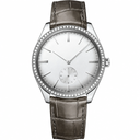 Dress watch with silver dial, diamond bezel, and brown leather strap