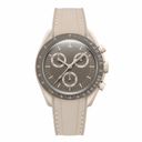 Beige chronograph watch with taupe dial and beige silicone strap on white background